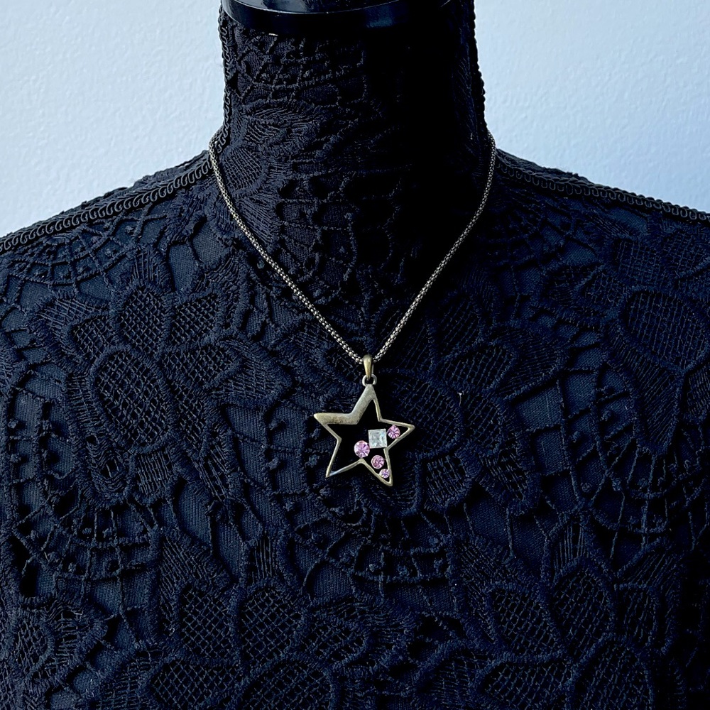 Laila Rowe copper color stat necklace with pink rhinestones